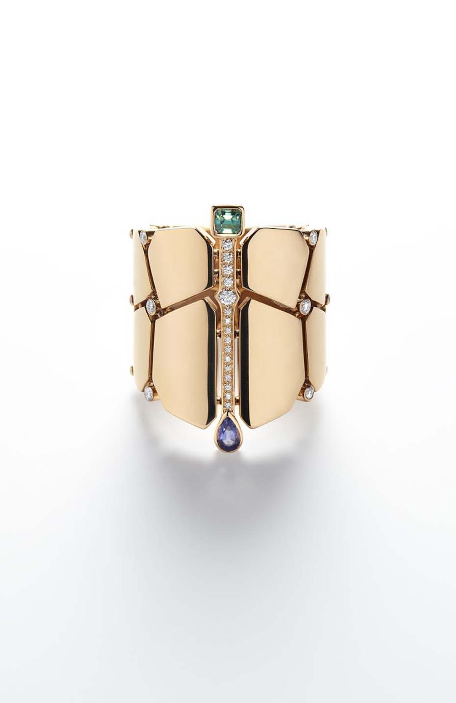 Hermès Niloticus rose gold cuff featuring a series of coloured stones including a pear-shaped iolite and a baguette-shaped beryl as well as brilliant-cut diamonds
