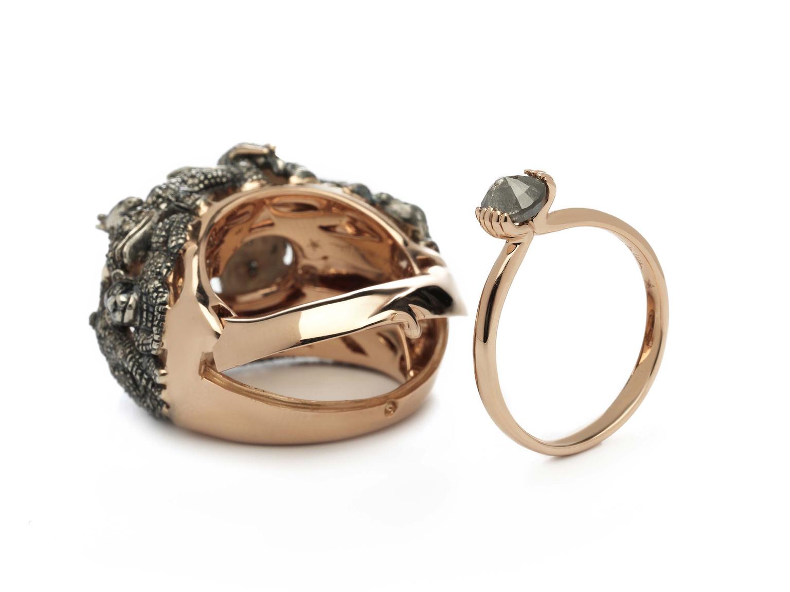 Bibi van der Velden's "ring within a ring", which will be shown for the first time at The Couture Show 2014. The main ring is decorated with miniature elephants, giraffes, lions and rhinos, while the hidden ring depicts hands clasping a brown diamond