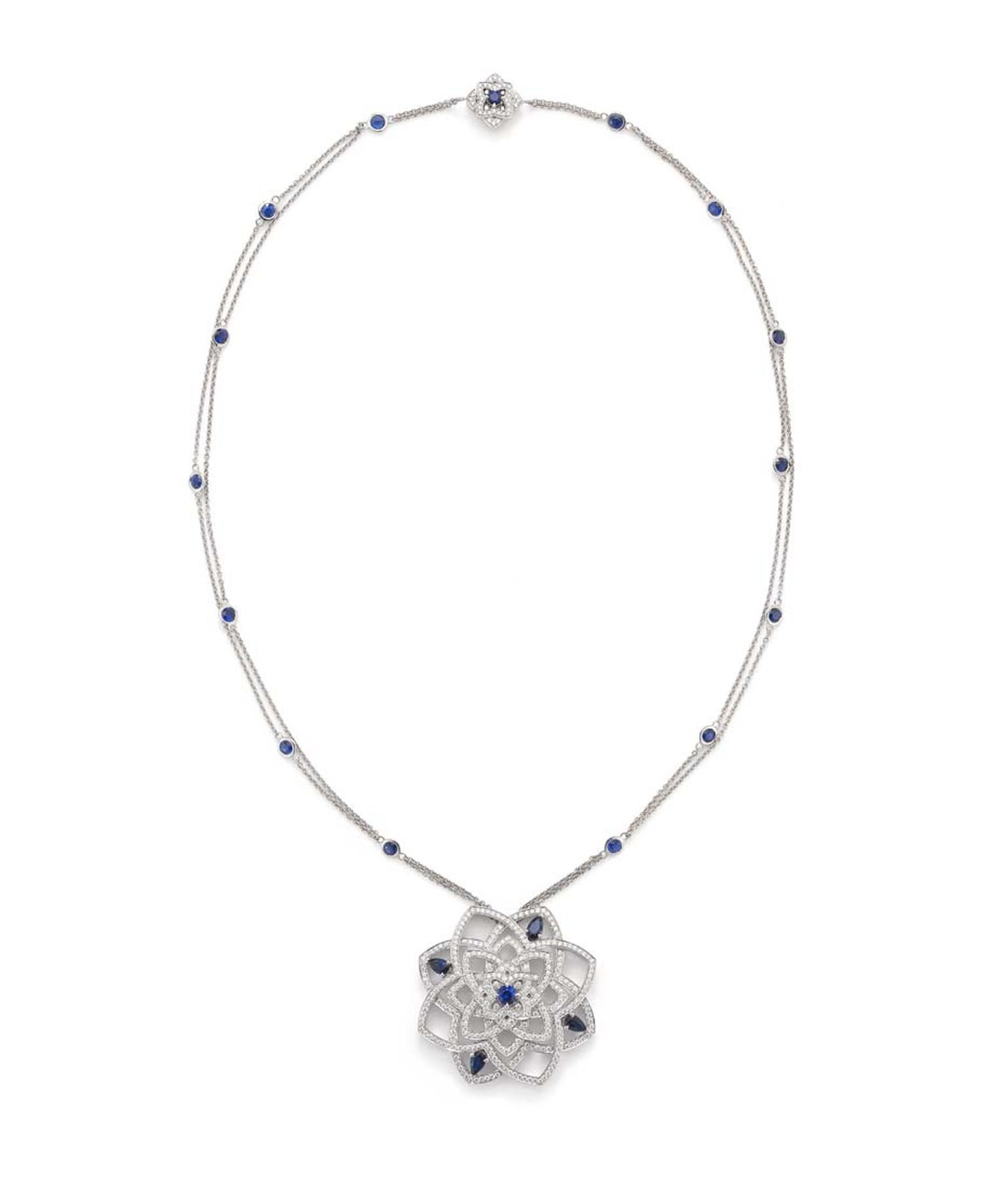 Mappin & Webb Floresco collection high jewellery pendant in white gold with diamonds and sapphires, suspended from a sapphire-studded chain with a diamond and sapphire clasp