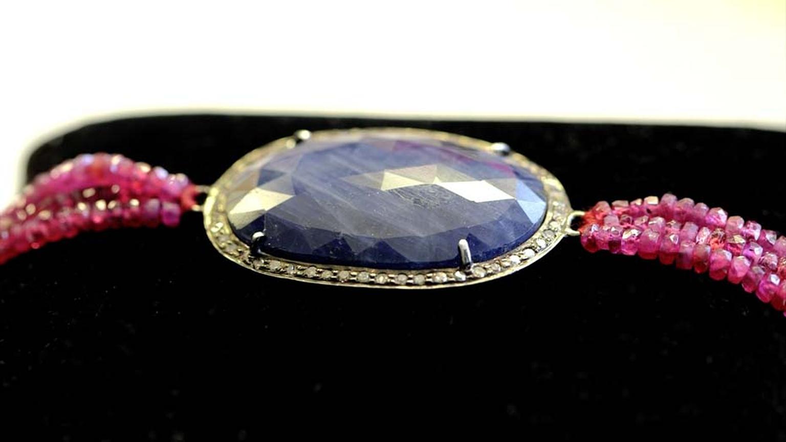 Jade Jagger NeverEnding bracelet with oval blue sapphire, ruby bead and diamonds, available exclusively at 1stdibs.com