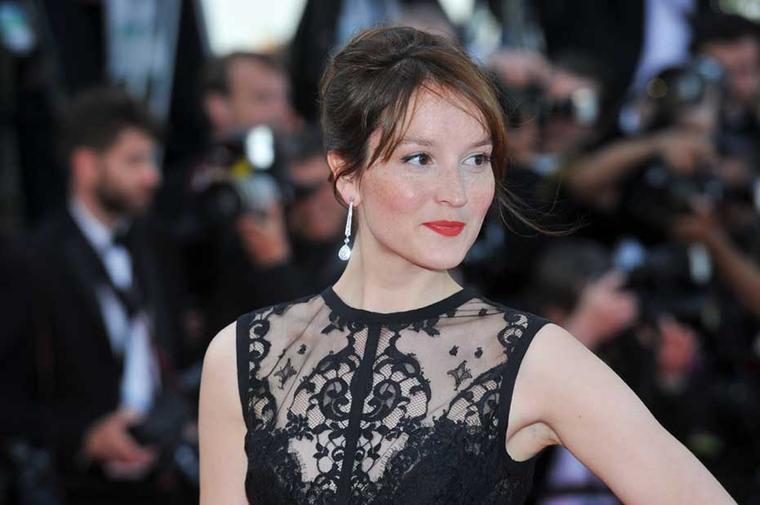 Actress Anais Demoustier, who plays the lead in 'Bird People', walked the Cannes Film Festival red carpet for the premiere of her new film wearing diamond earrings from Chaumet's 12 Vendôme collection