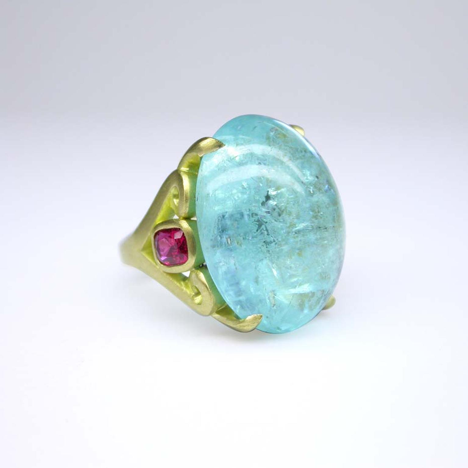 James Fairhurst ring in yellow gold with a Paraiba tourmaline and pink spinels (£17,400)