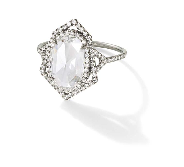 Monique Péan Mineraux engagement ring in recycled oxidised platinum, set with an antique white oval rose cut diamond and diamond pavé ($52,770)