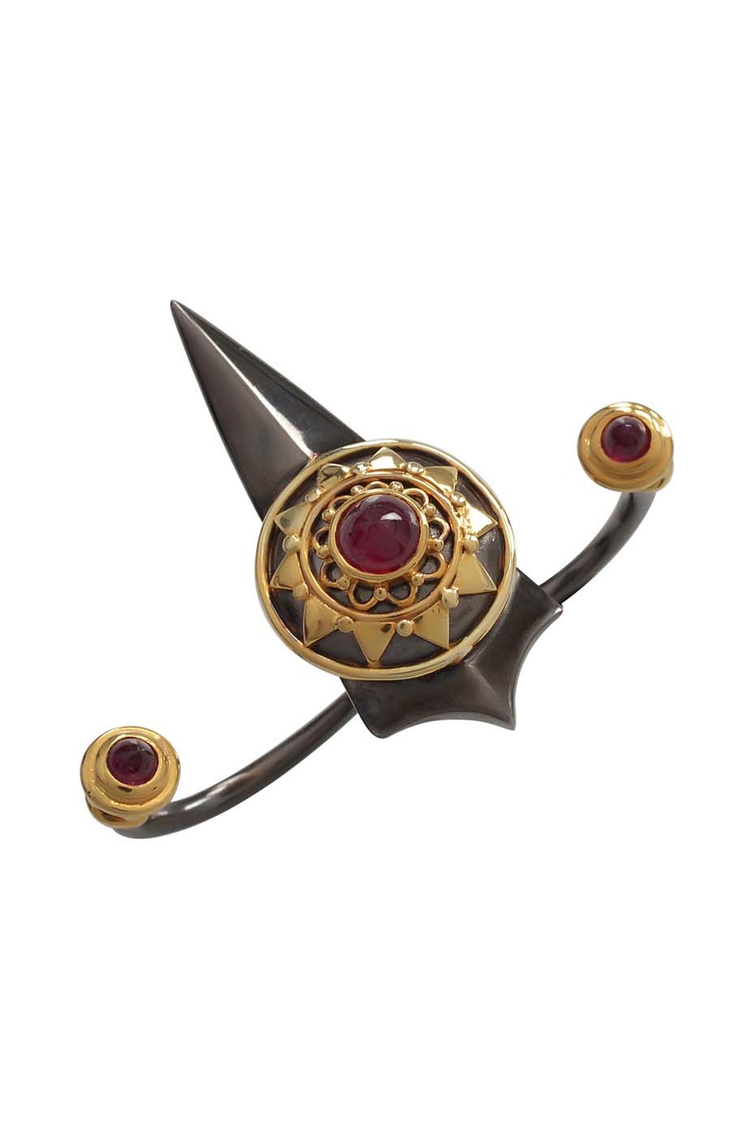 Amrapali Dark Maharaja Armoured Sword double ring in silver and gold with rubies.