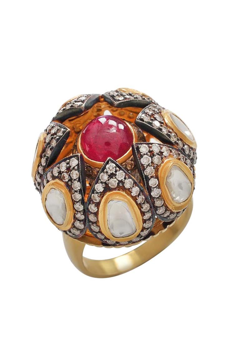 Amrapali Dark Maharaja Shielded Treasure Spin ring in gold and silver, with rubies and diamonds.