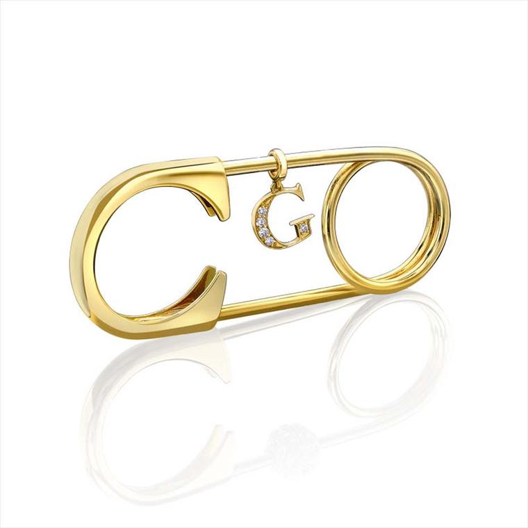 Sybarite Safety Pin gold ring with removable diamond charms.