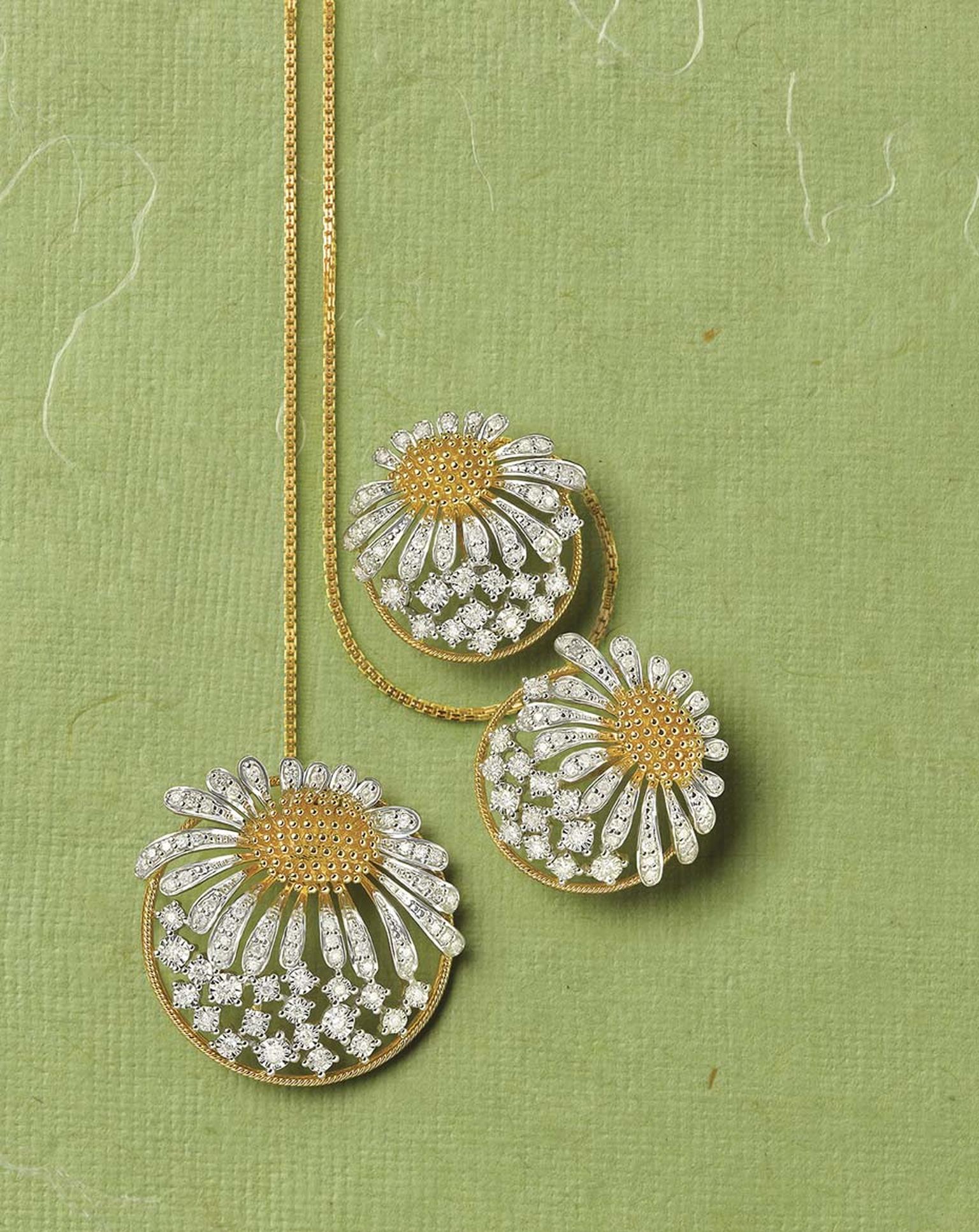 Tanishq Zyra collection white and yellow gold sunflower earrings and necklace studded with white diamonds.