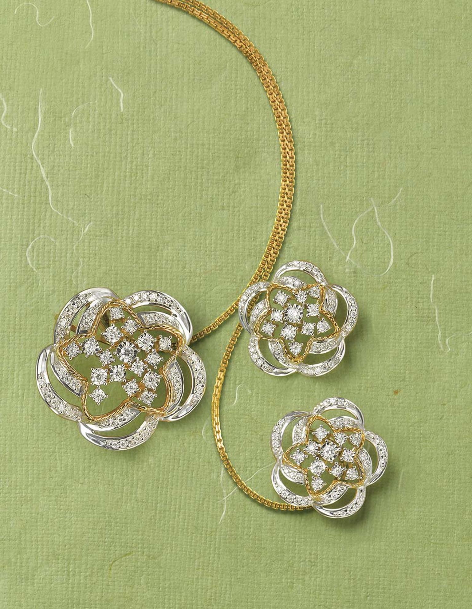 Tanishq Zyra collection white and yellow gold hydrangea earrings and necklace with white diamonds.