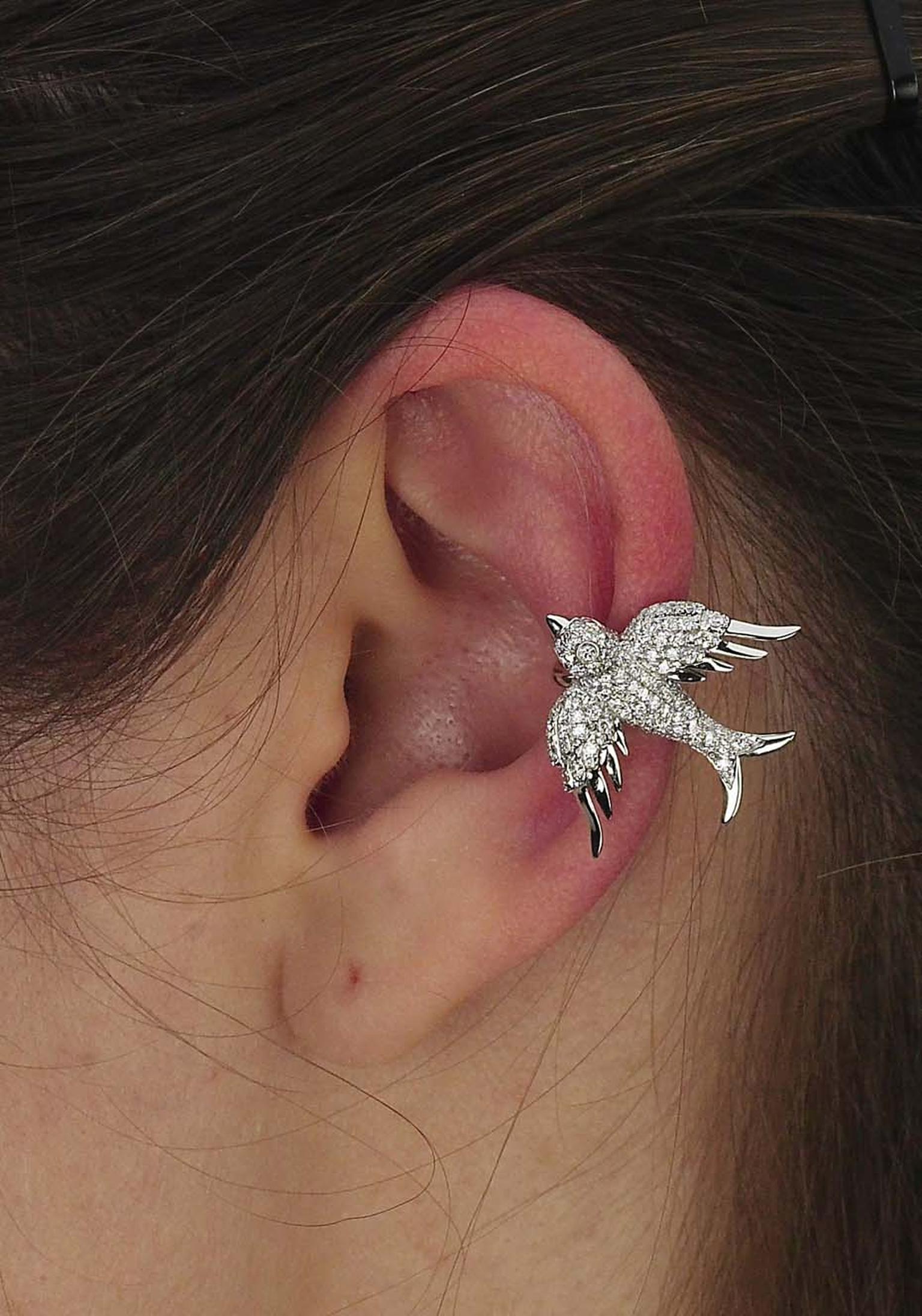Colette Blue Drift white gold Bird ear cuff with white diamonds ($6,800).