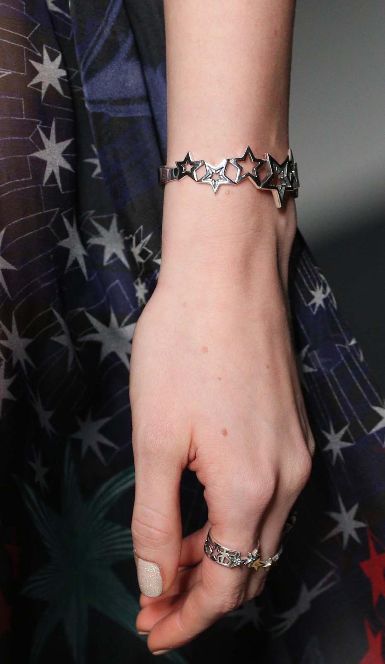 Azza Fahmy for Matthew Williamson sterling silver Stars bracelet and Stars Stack rings.