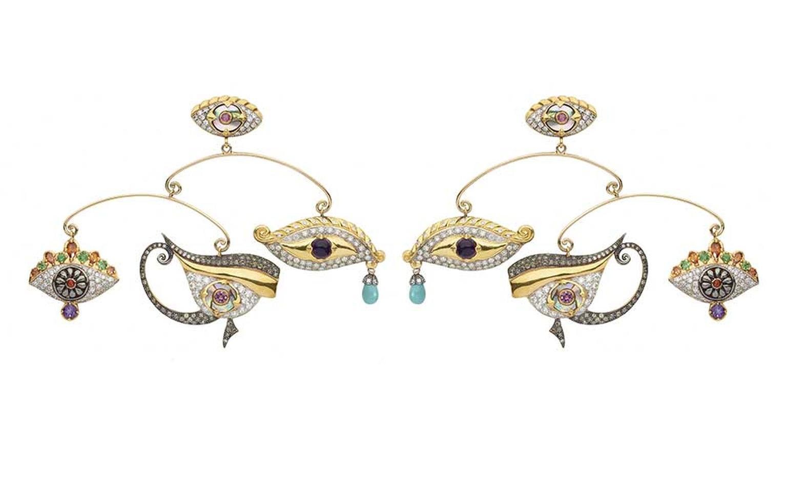 Sylvie Corbelin Fascination collection mobile earrings featuring three gem-encrusted eyes suspended from a central stud, also in the shape of an eye.