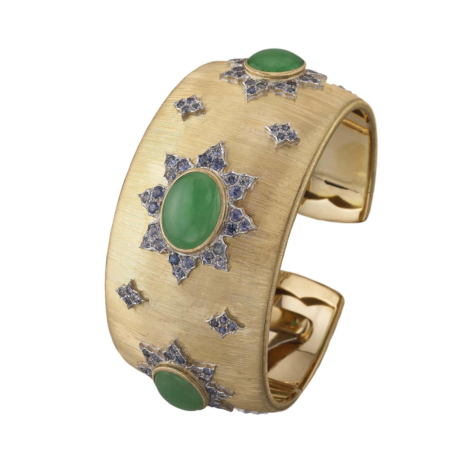 Buccellati cuff bracelet in gold, "regato" engraved and set with 19.44ct green jade and blue sapphires.