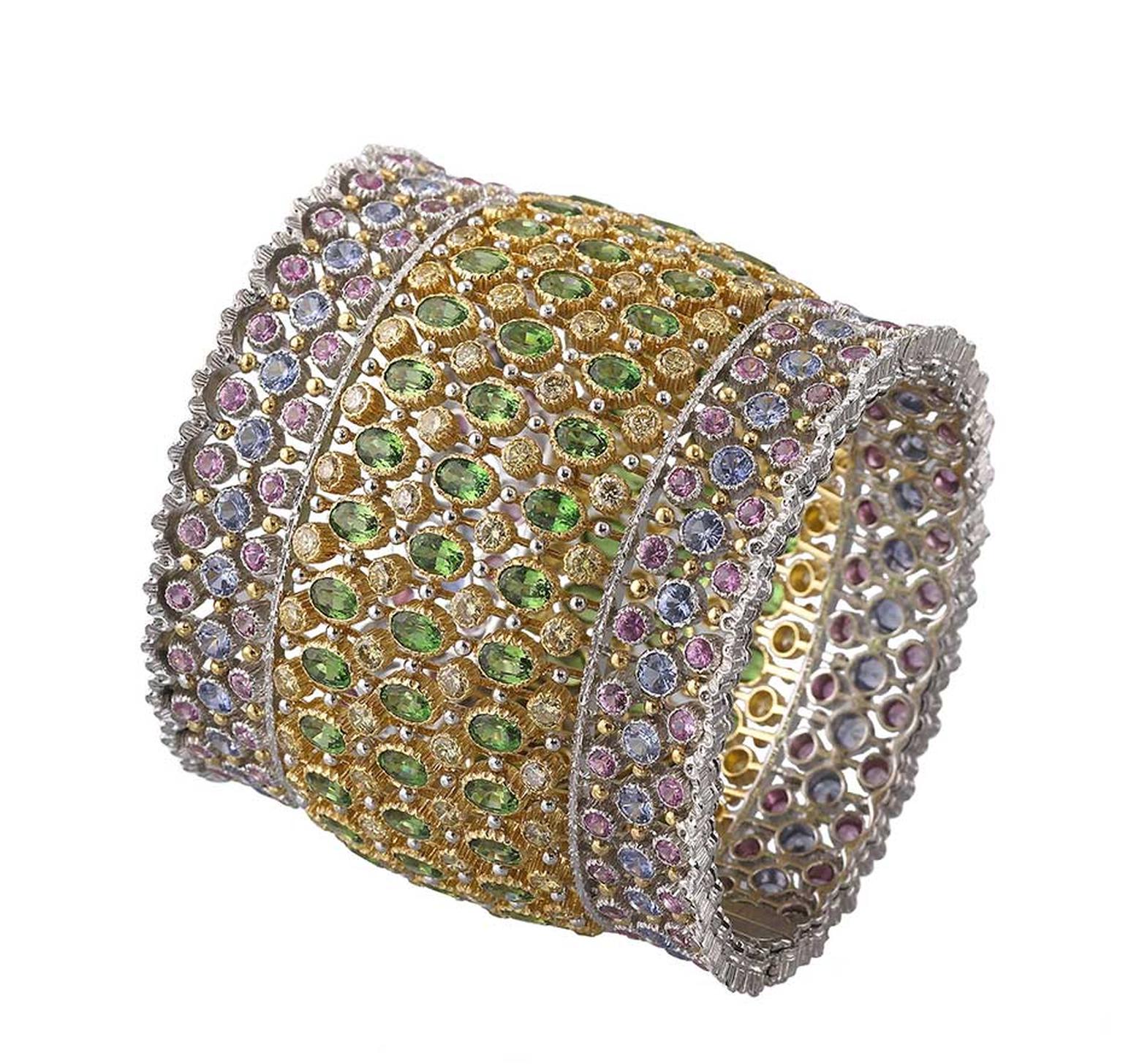 Buccellati cuff bracelet with 51.41ct tsavorites, Fancy diamonds and blue and pink sapphires.