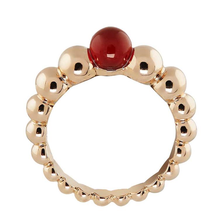 Van Cleef & Arpels Perlée Couleur ring in rose gold with a cabochon cornelian stone.