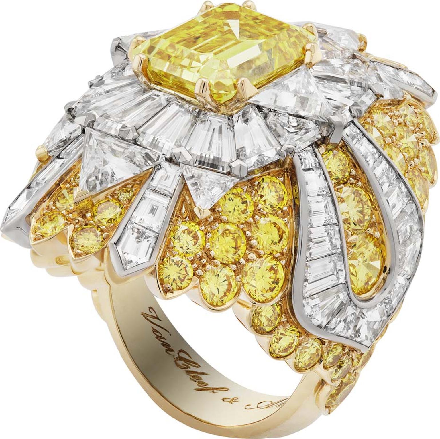 Van Cleef & Arpels Peau d'Ane Happy Marriage collection Heavenly Beauty ring in white and yellow gold with a central Vivid yellow emerald-cut diamond, white trillion-cut diamonds and round and fancy-cut yellow diamonds.