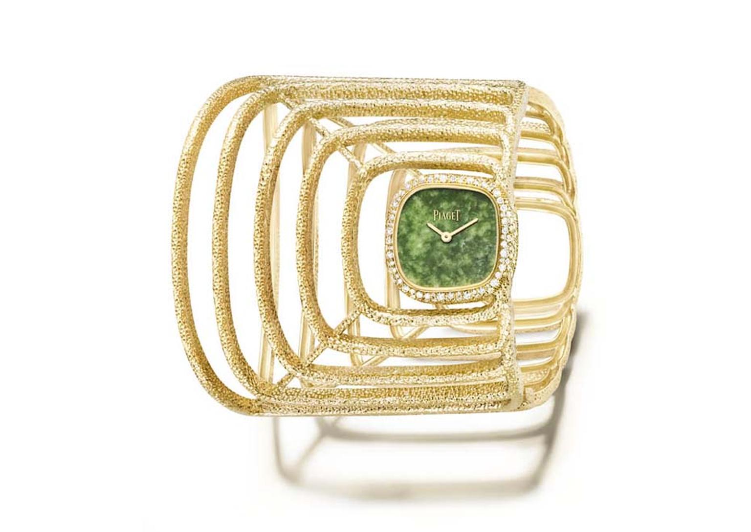 Piaget Extremely Piaget collection cuff watch featuring an off-centred natural jade dial caught in a hammered yellow gold cobweb set with 236 pave diamonds.
