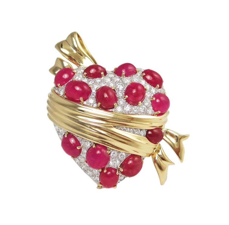 Verdura Sashed Heart brooch, set with rubies and diamonds in gold, was first commissioned by Tyrone Power for his wife Anabella in 1941 and has been recreated to celebrate Verdura's 75th anniversary.