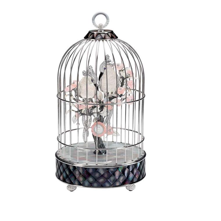 Chanel’s white gold Birdcage clock featuring two cockatoos entwined amongst pink camelias features 61.5ct of brilliant-cut diamonds, sculpted moonstone, sculpted pink quartz, rock crystal and gray and white mother-of-pearl.