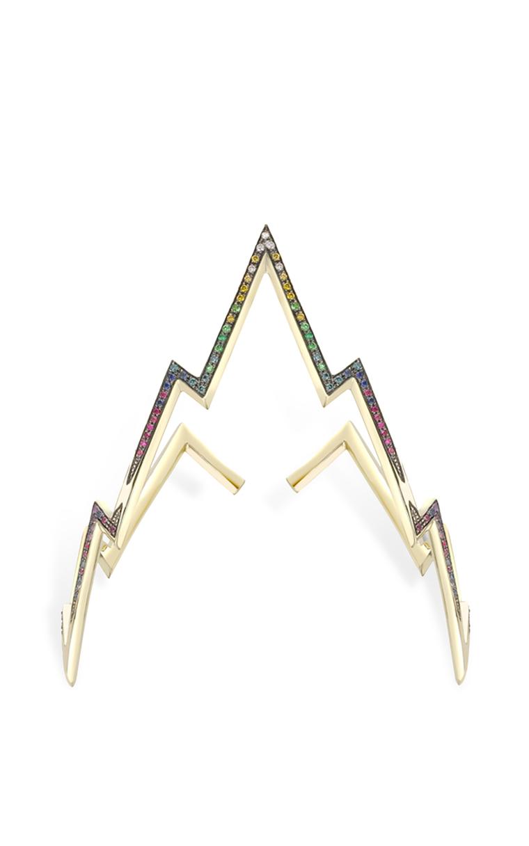 Venyx's Miss Zeus arm cuff features gold lightening bolts that wrap around the arm, encrusted with diamonds and coloured stones (available at modaoperandi.com).