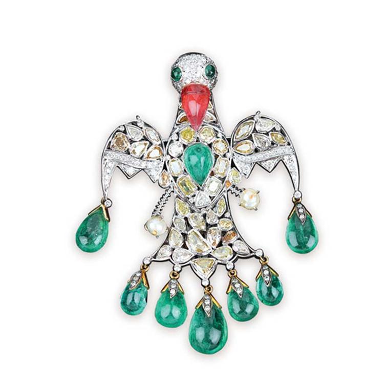 Golecha Bird brooch studded with kundan polki, ruby and emeralds.