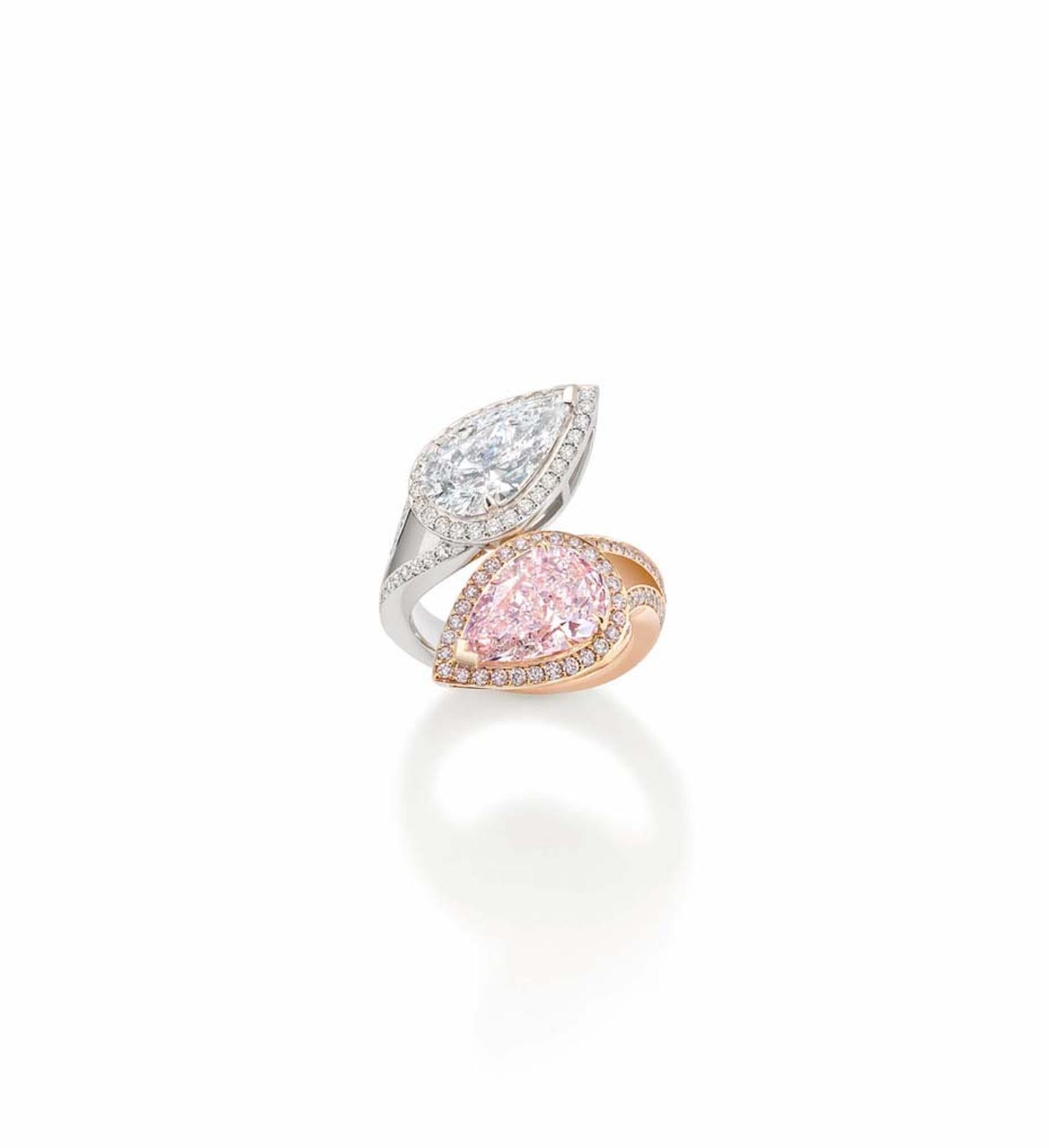 Boodles Gemini collection ring features a natural light pink, pear-shaped diamond on one prong, mirrored by a stunning D colour white diamond on the other.