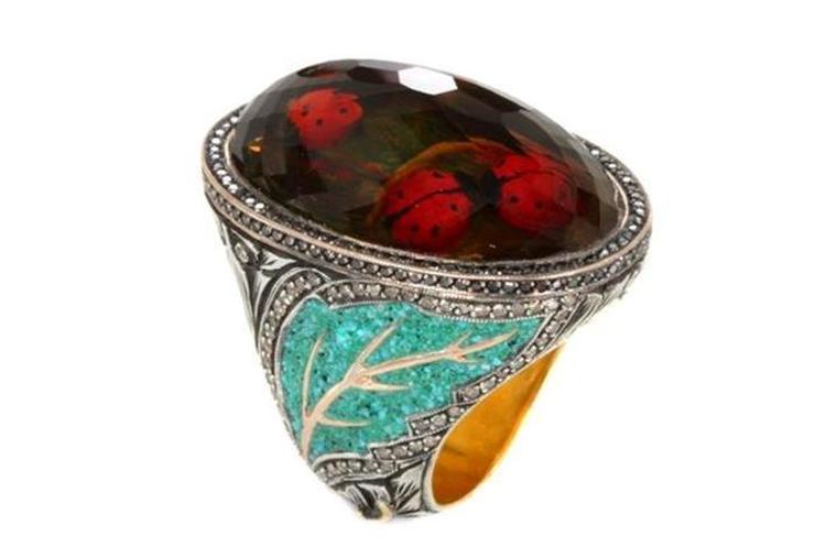 Sevan Biçakçi Ladybird ring with scurrying ladybugs beneath an inversely carved smoky topaz.