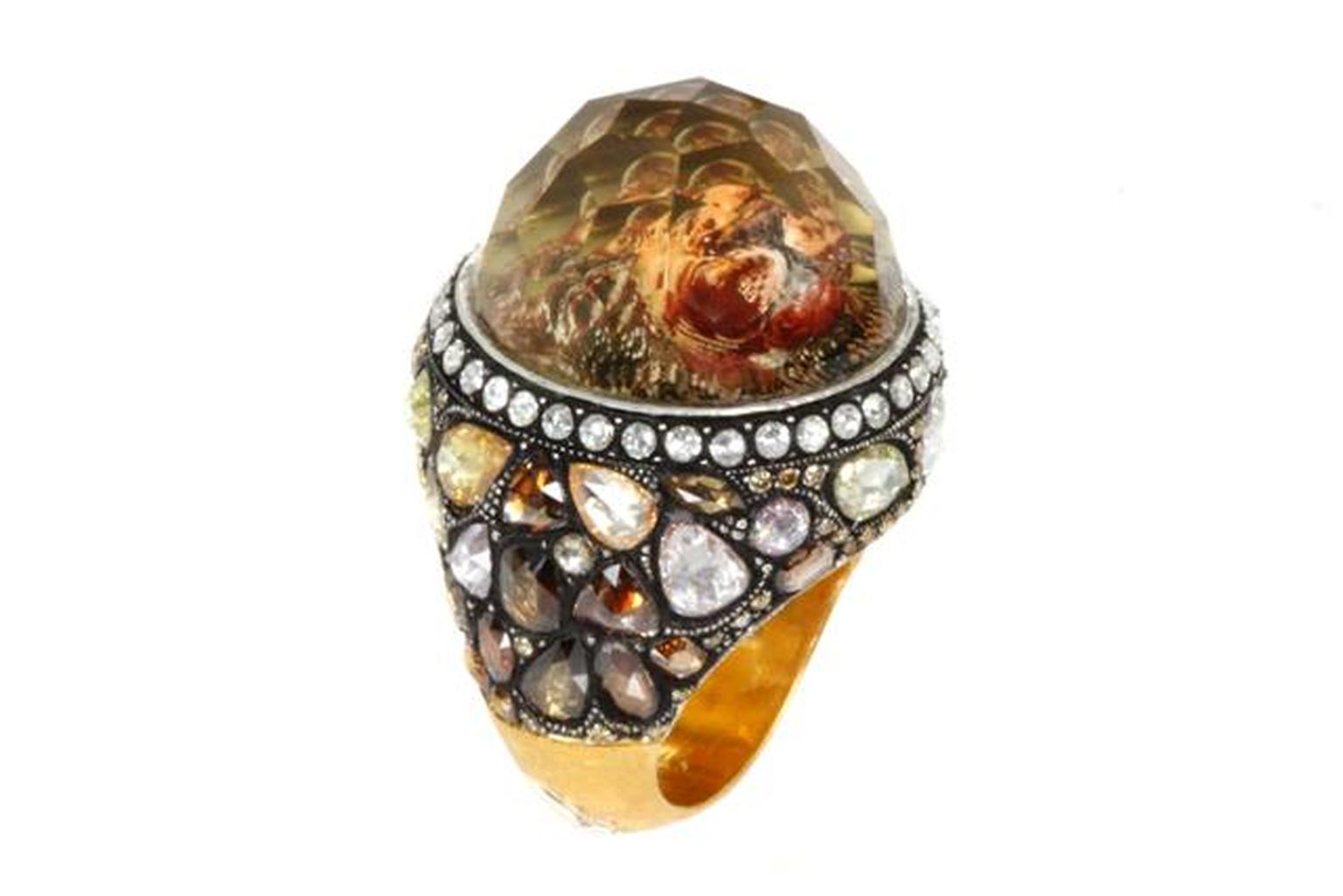 Sevan Biçakçi one-of-a-kind gold and sterling silver ring featuring an inversely carved topaz centre stone reflecting a lion surrounded by coloured diamonds.