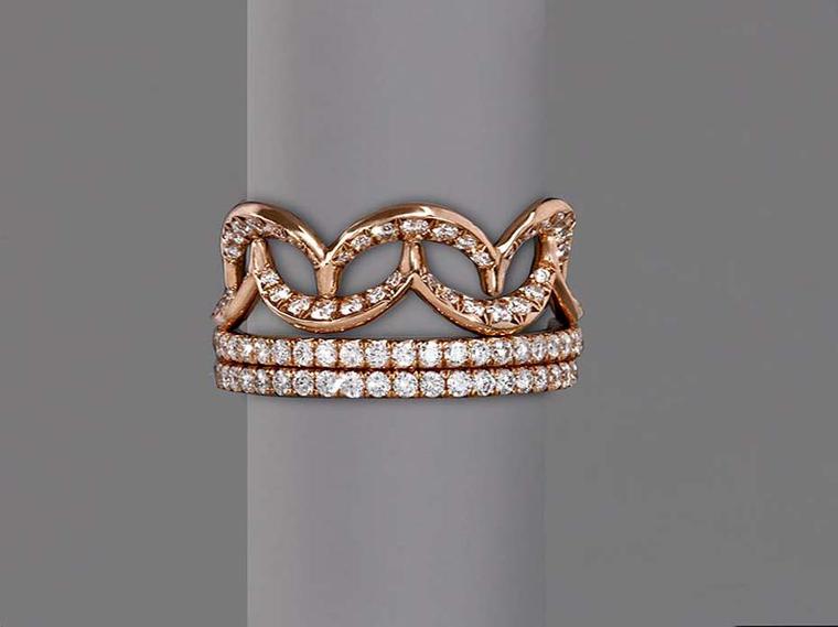 Jado Crown collection interlocking ring in gold with diamonds.