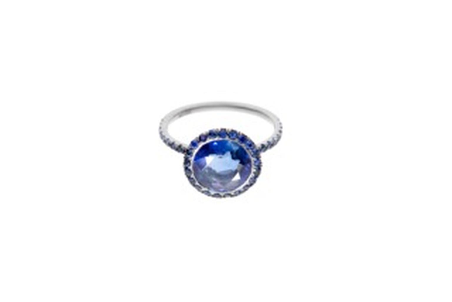 William Welstead ring featuring a central sapphire surrounded by a pavé of sapphires. Available exclusively from Dover Street Market.