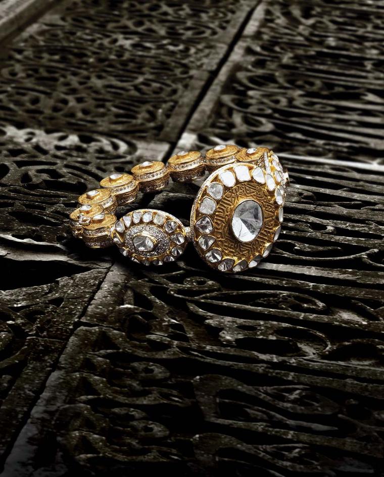 Birdhichand Ghanshyamdas Aks collection studded bangle featuring kundan polki diamonds set into gold.