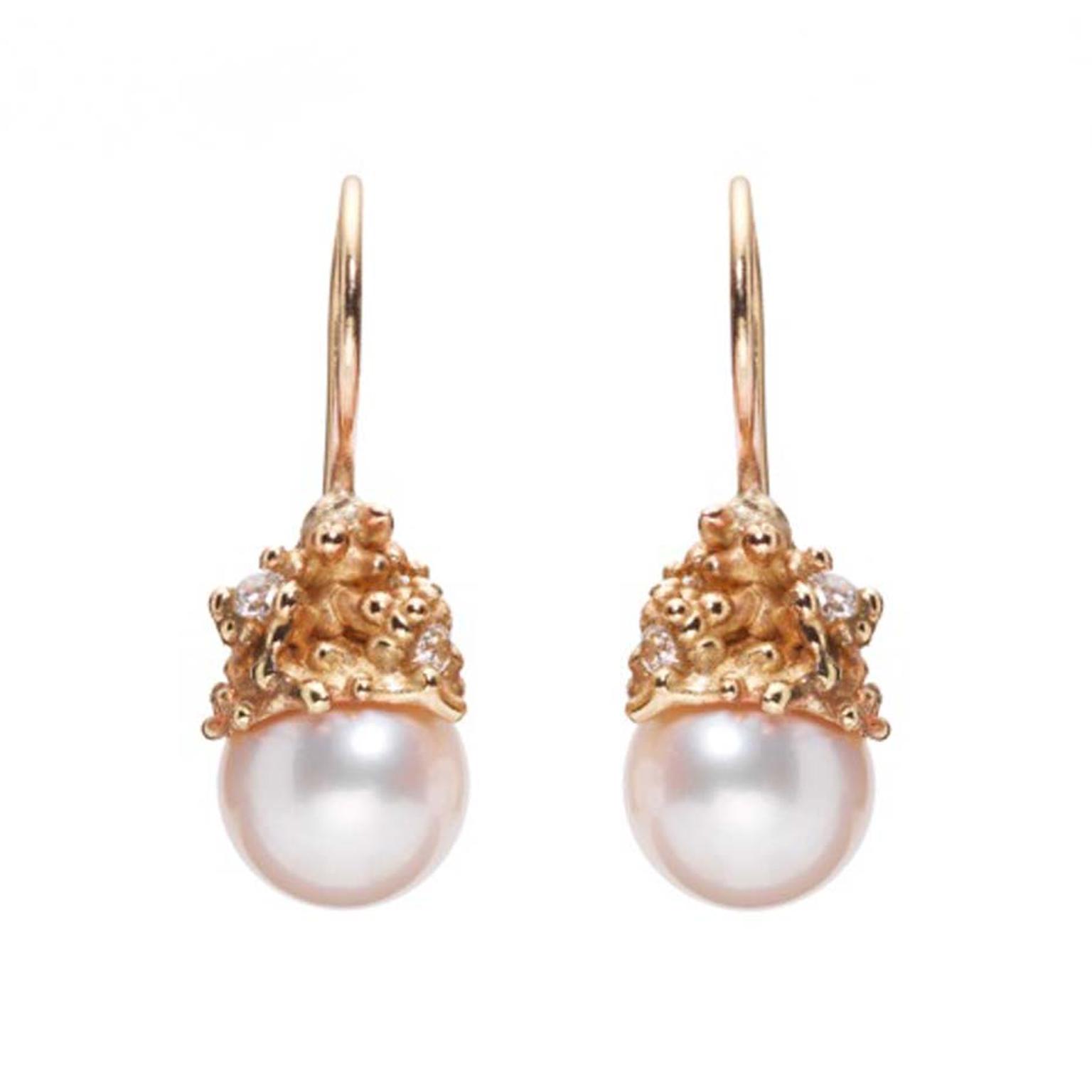 Ruth Tomlinson rose gold and pearl earrings.