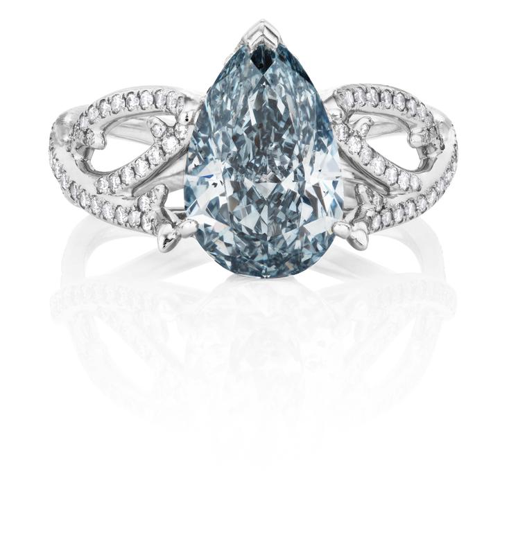 De Beers 1888 Master Diamonds Volute ring featuring a pear-shaped blue diamond solitaire.