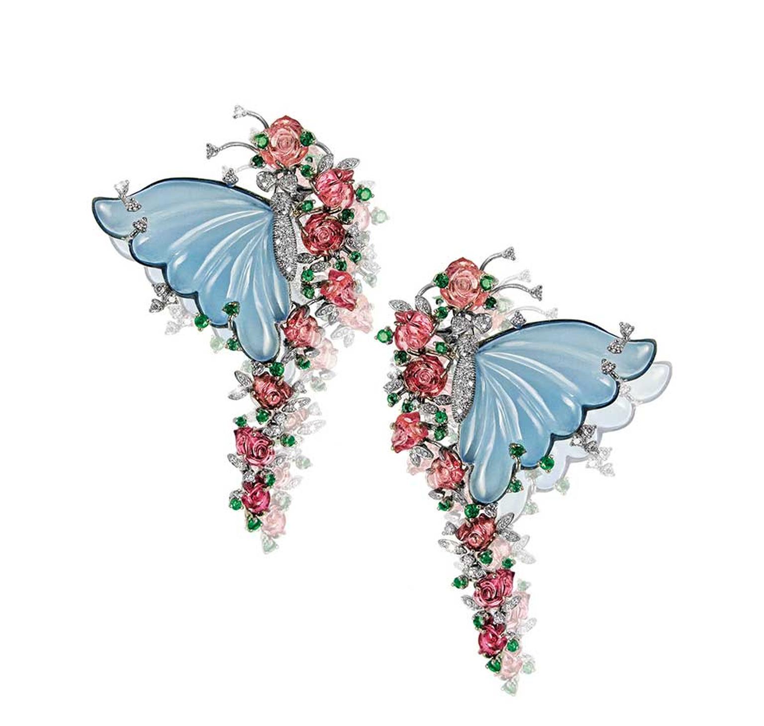 Butterfly earrings by Mirari with carved blue onyx wings, tourmaline flowers, emeralds and diamonds.