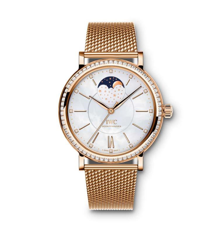 IWC's Portofino Midsize Automatic Moon Phase Ref. IW459005 watch features a red gold case set with 66 diamonds, a white mother-of-pearl dial set with 12 diamonds and a Milanese red gold mesh bracelet.