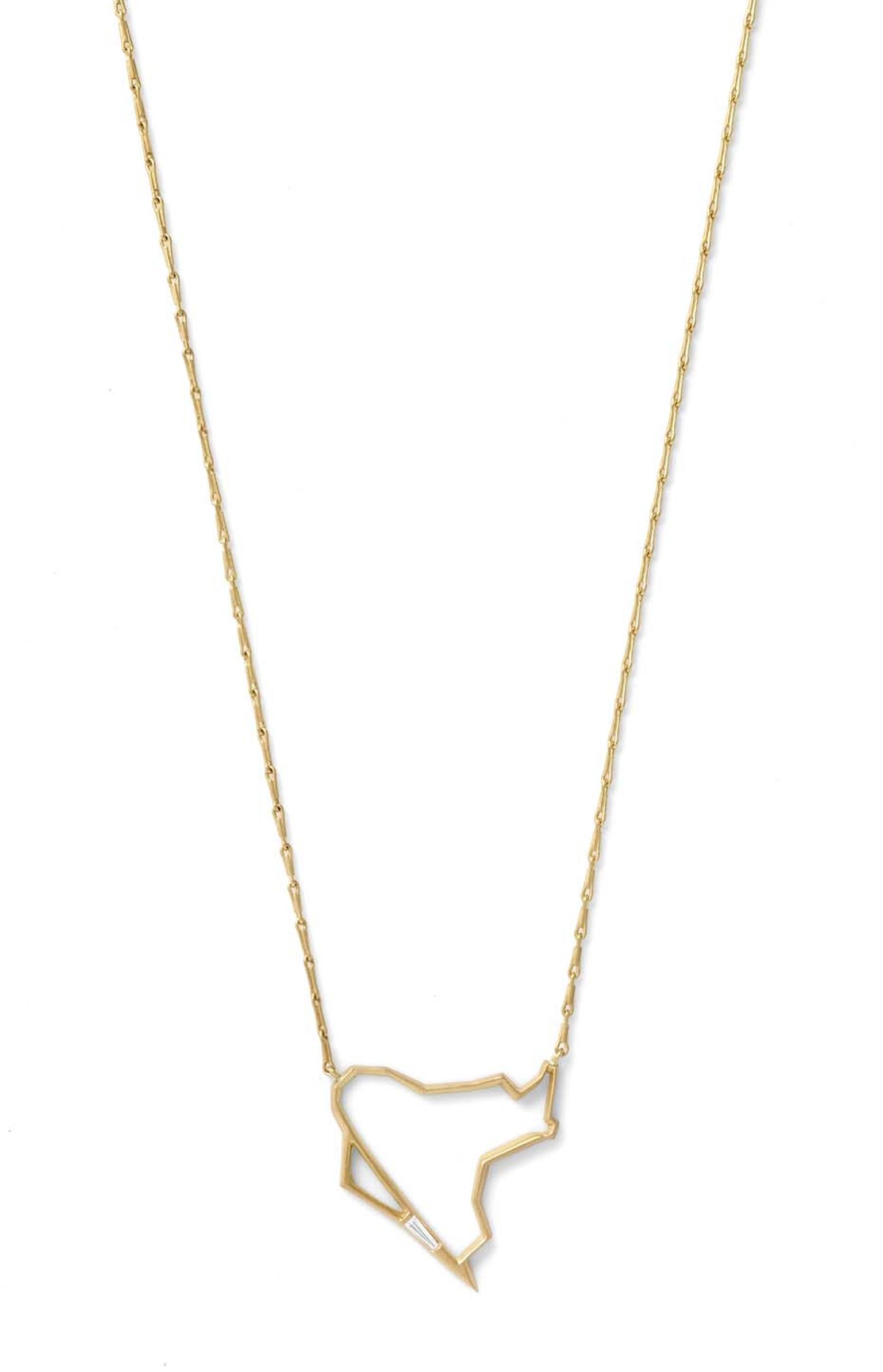 Monique Péan Seto geometric pendant in gold, set with a delicate white diamond baguette.