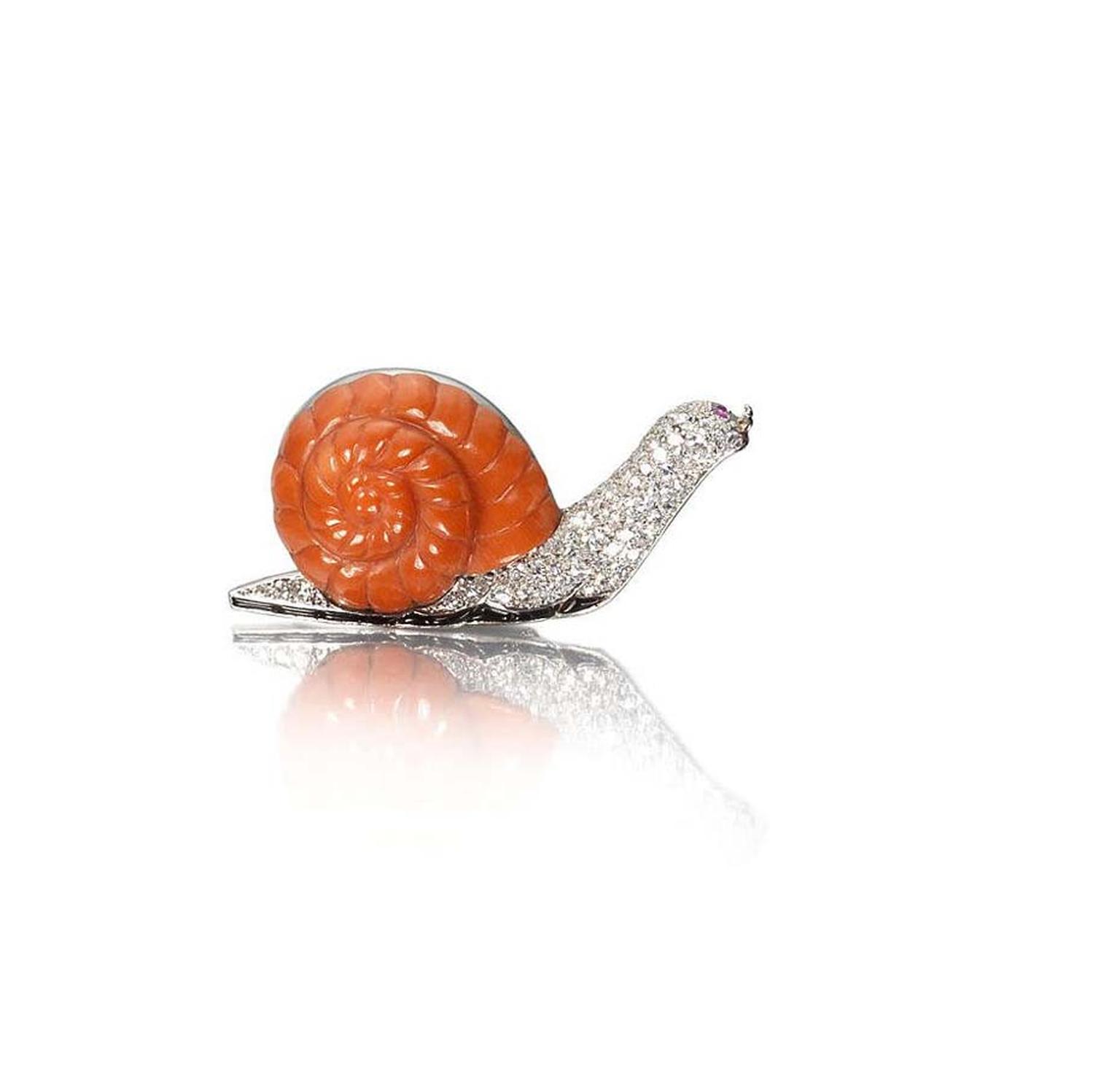 A 1930s Cartier coral and diamond brooch in the shape of a snail far outstripped its £4,000-6,000 estimate to sell for £27,500.
