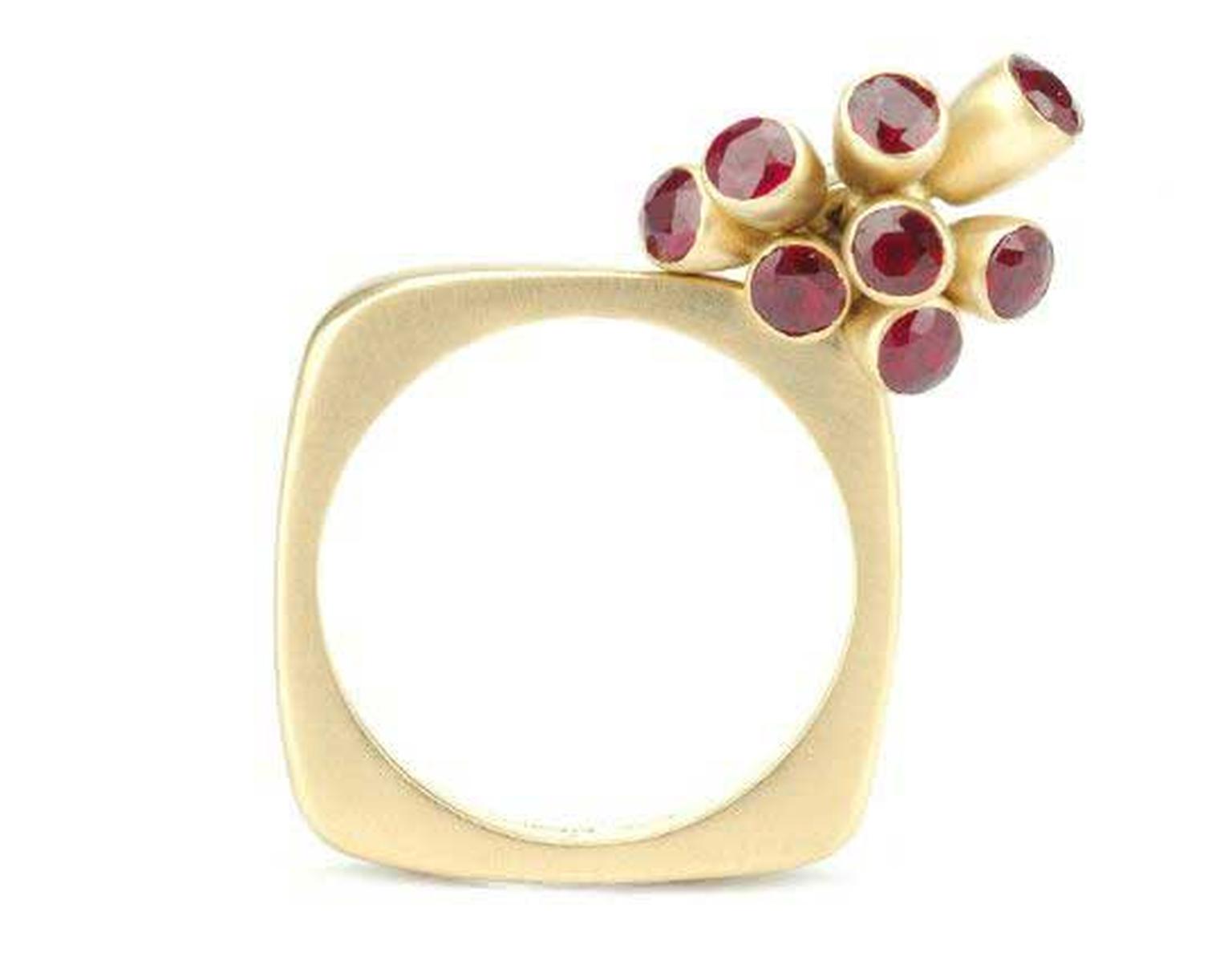 Mirri Damer gold square ring featuring seven moving ruby buds.
