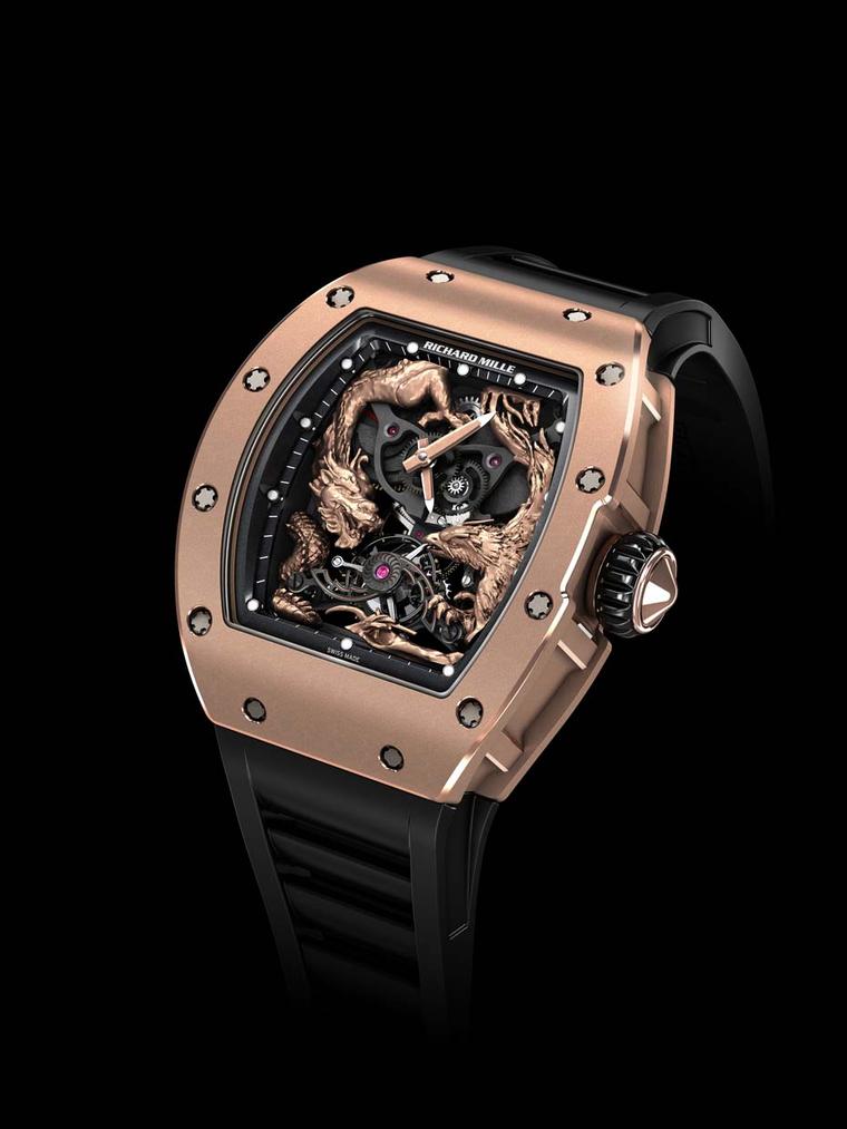 The Richard Mille RM 57-01 Phoenix and Dragon Jackie Chan watch features a hand-sculpted rose gold dragon curled around the left side of the case and a phoenix, wings spread in flight, on the right.