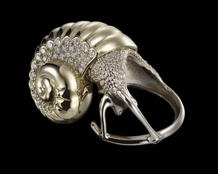 Dashi Namdakov Snail ring in white and yellow gold with diamonds.