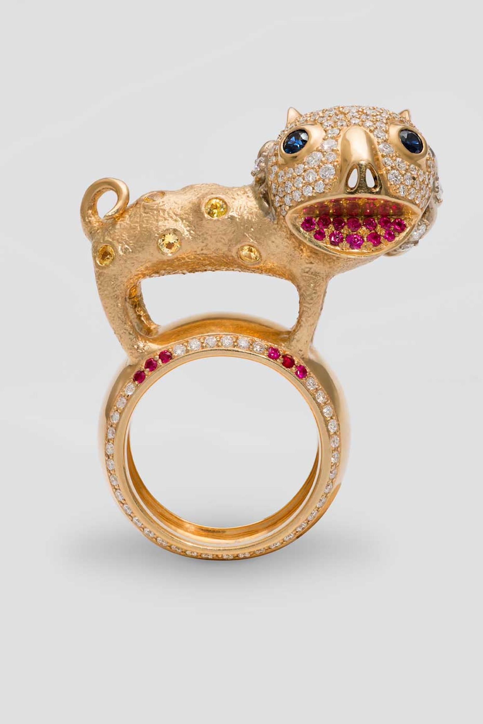 Dashi Namdakov Lion ring in white and yellow gold with diamonds, rubies and sapphires.