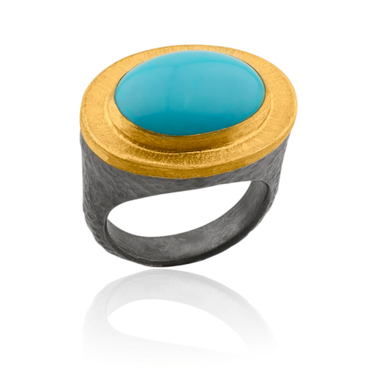 Lika Behar cabochon turquoise ring in a collet setting of yellow gold and silver.