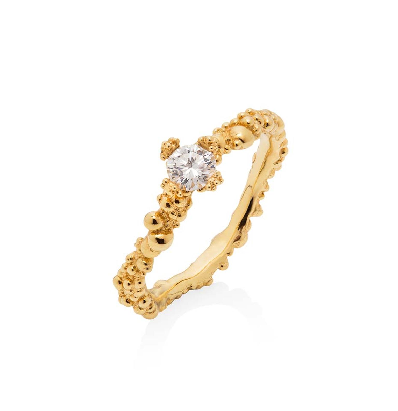 Ornella Iannuzzi Coralline Circle ring with a central brilliant-cut diamond.
