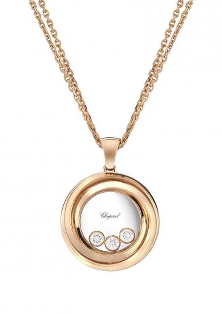 Chopard Happy Hearts Emotions rose gold necklace with three free floating diamonds.
