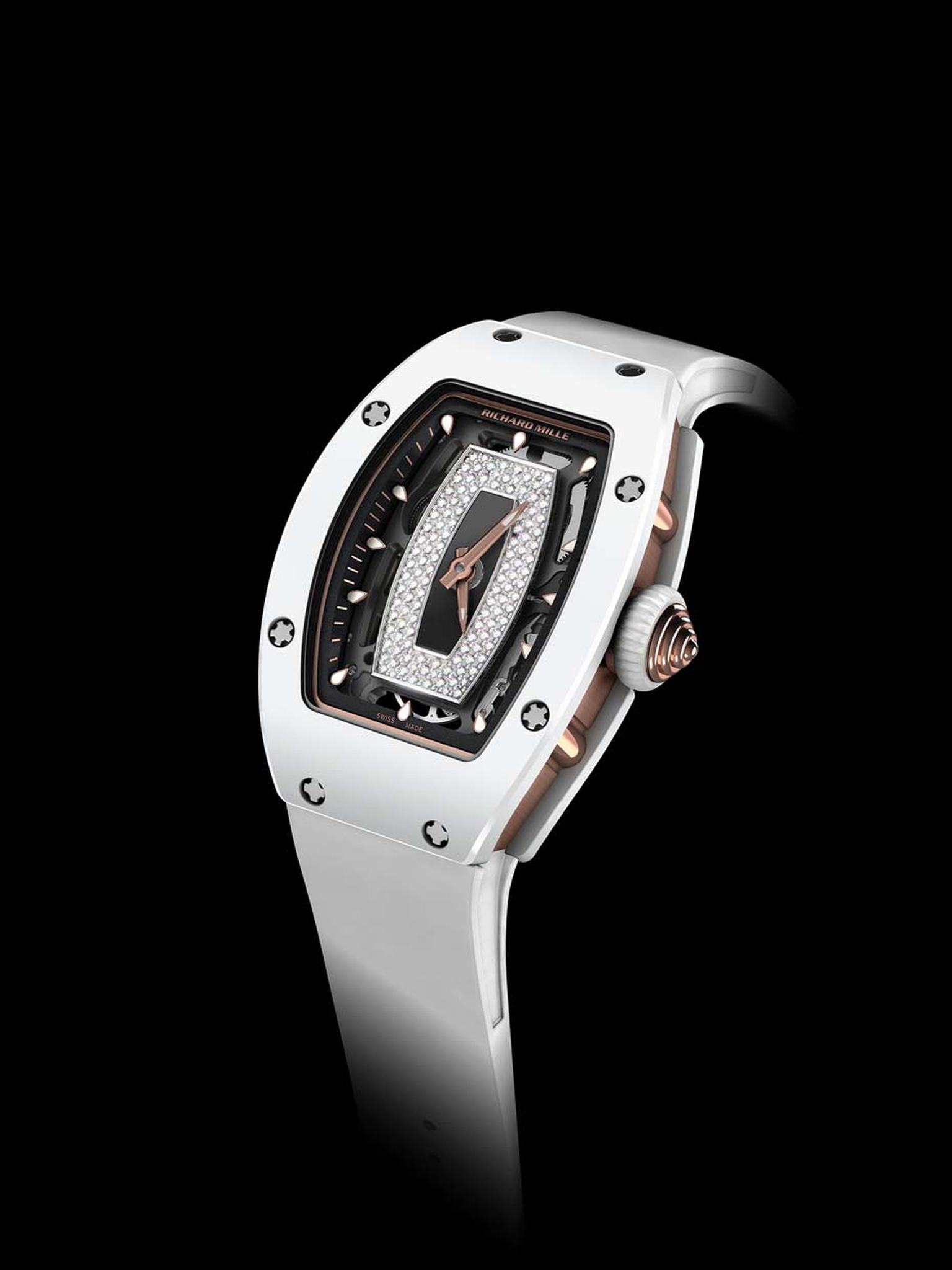 Crafted from white ceramic and red gold, the Richard Mille 07-01 watch features a tonneau-shaped case housing a skeletonised dial that showcases the movement. The decorative pavé diamond inner dial mirrors the shape of the bezel and has central luminescen