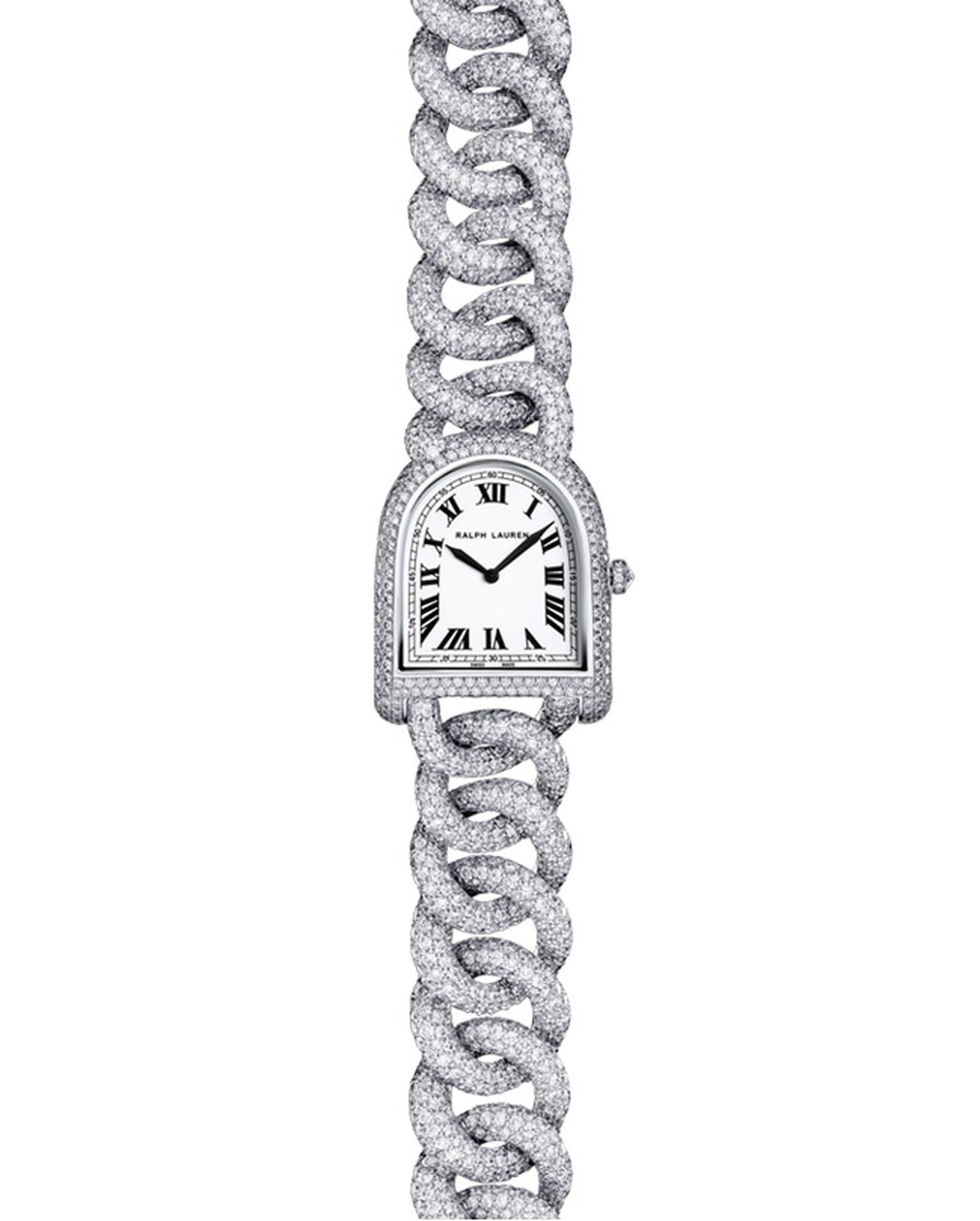 The Ralph Lauren Stirrup Petite watch offers a daintier case measuring just 23.3mm by 27mm and an intertwining link bracelet that wraps elegantly around the wrist. The most opulent model is this Petite Stirrup Link watch in white gold and diamonds. This s