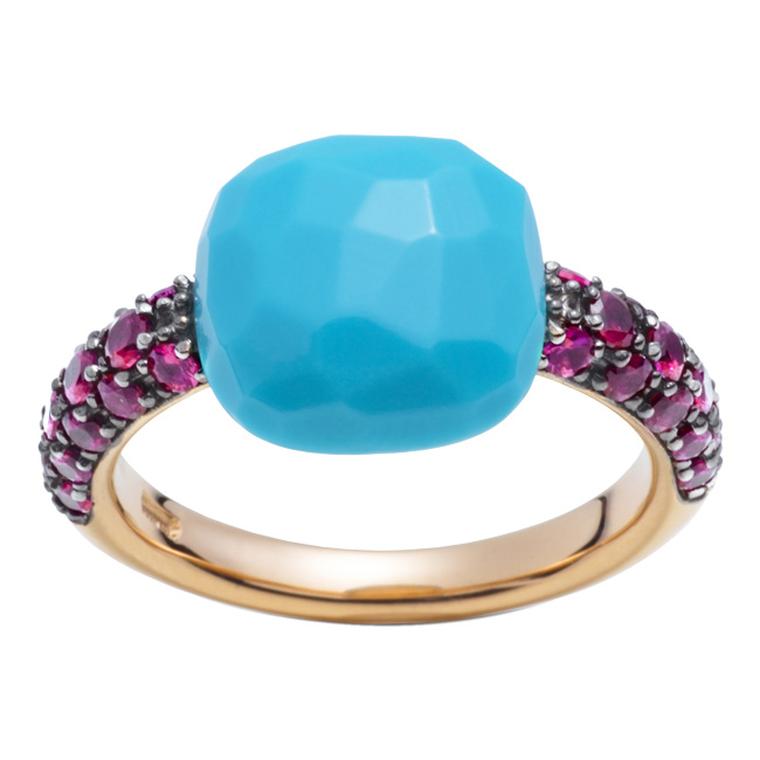 Pomellato Capri ring in rose gold with rubies and a cushion-cut turquoise.