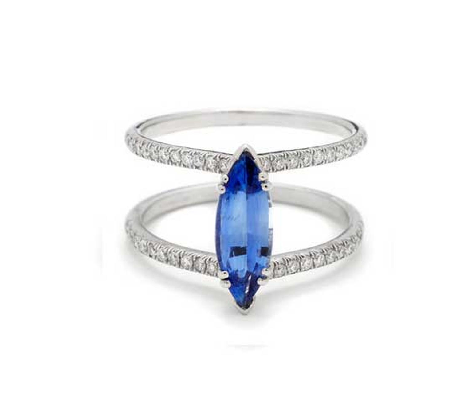 Anna Sheffield Attelage marquise-cut sapphire and diamond ring in white gold, which is designed so that you can wear your wedding band and eternity ring in-between the diamond-set bands (US$9,200).