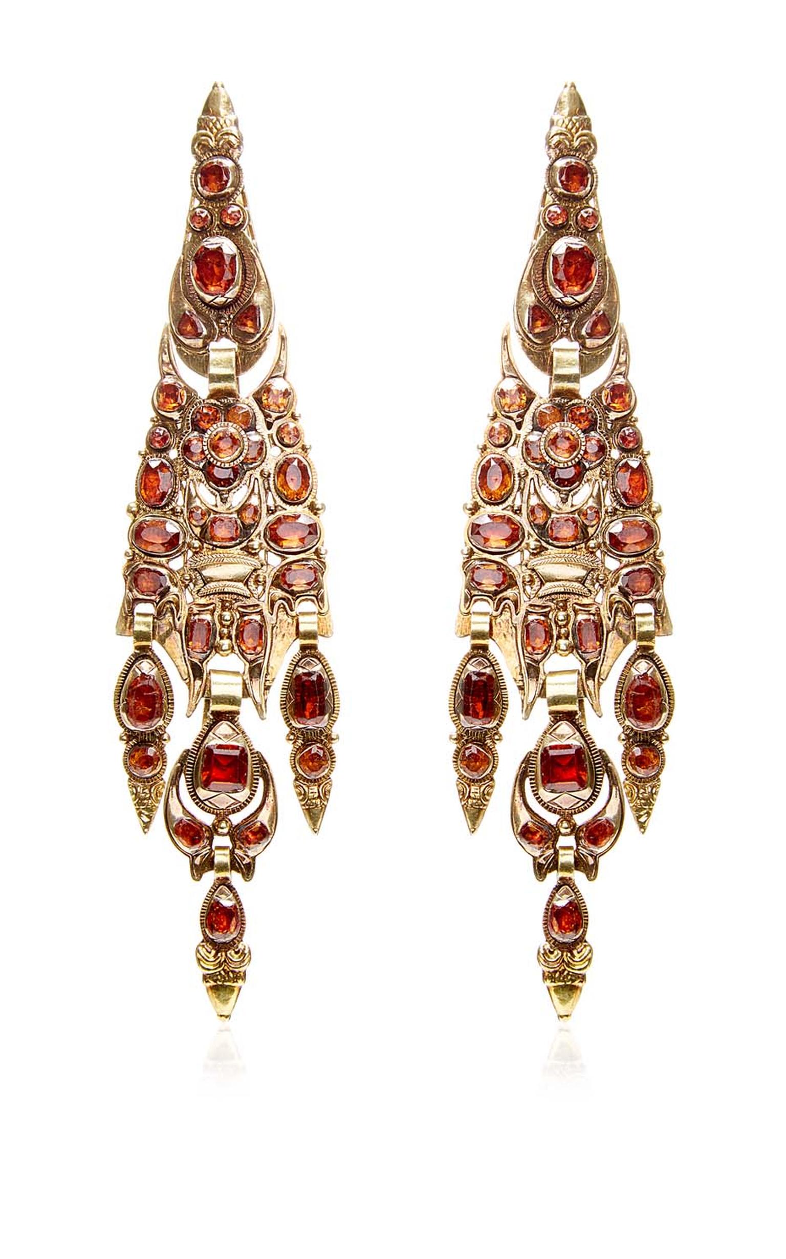 Catalan garnet earrings with a floral motif that date from the late 19th century. Available at Moda Operandi.
