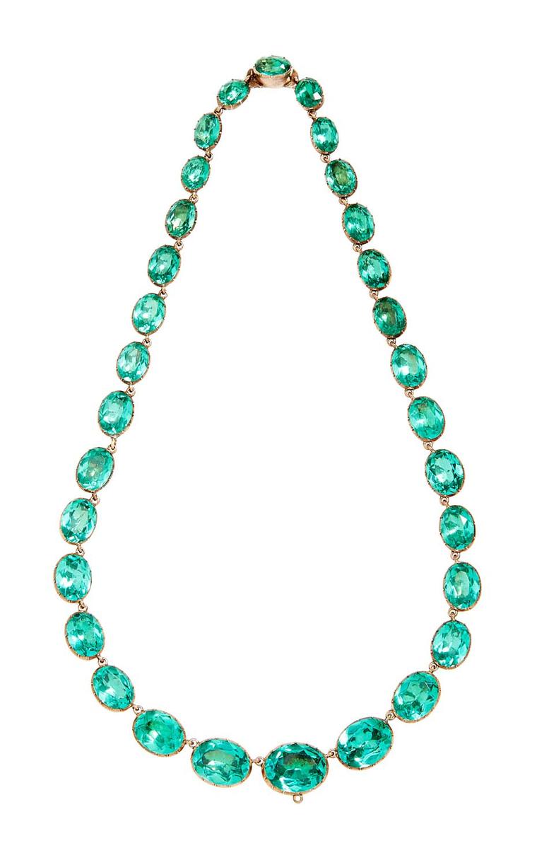 FD Gallery's 19th century antique necklace featuring a series of graduated green paste with a gold foiled back setting. $15,000 at Moda Operandi.
