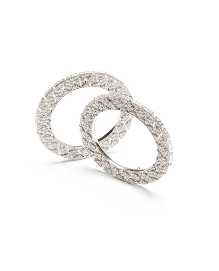 Pair of diamond bangles by famed Indian jeweller Bhagat set with 50.66ct diamonds and an additional 21.12ct of carré-cut diamonds. $480,000 at Moda Operandi.